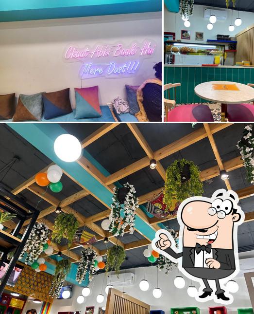 Take a seat at one of the tables at Chaat ka Chaska