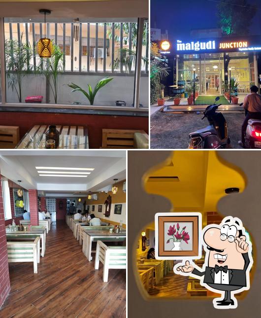 Take a seat at one of the tables at The Malgudi Junction