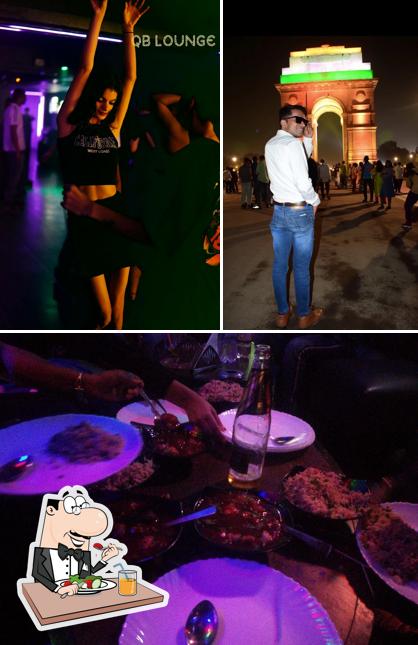 This is the picture displaying food and dining table at Qb Lounge