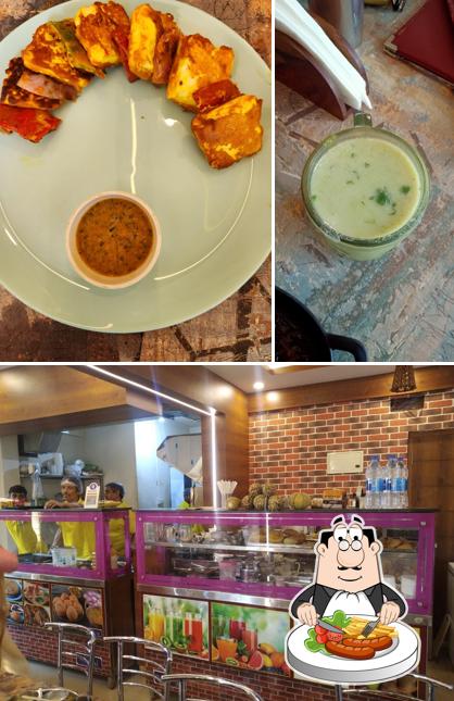 Take a look at the photo depicting food and interior at ANNAPURNA NAIVEDYAM