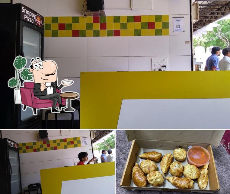 This is the image depicting interior and food at Yo Frankie, V.V.Nagar