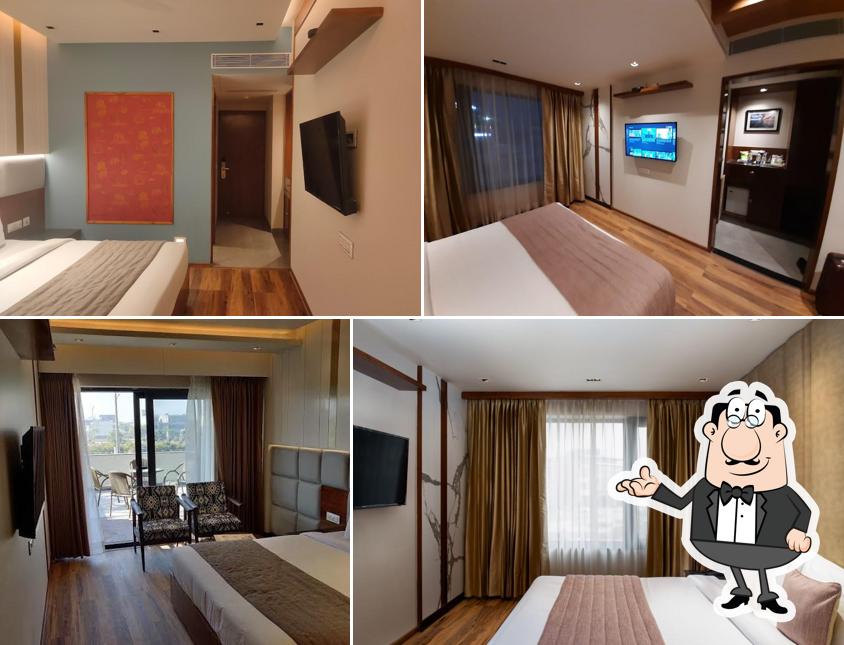 Take a seat at one of the tables at Hotel ANCHORAGE Mohali