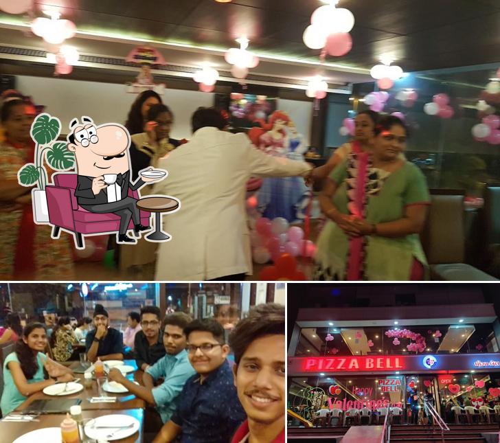 Take a seat at one of the tables at Pizza Bell