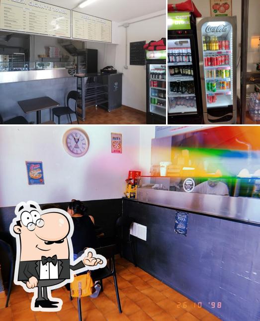 Dai un'occhiata agli interni di Pizzeria al taglio smeralda