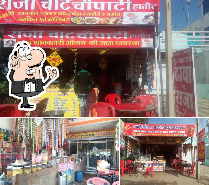 Take a seat at one of the tables at Raja Restaurant