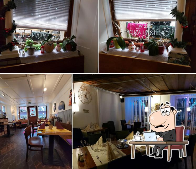 Dai un'occhiata agli interni di New Croix-Blanche Restaurant