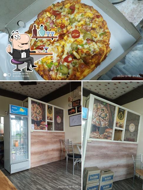 The picture of interior and pizza at Sky Light Cafe cake ceremony