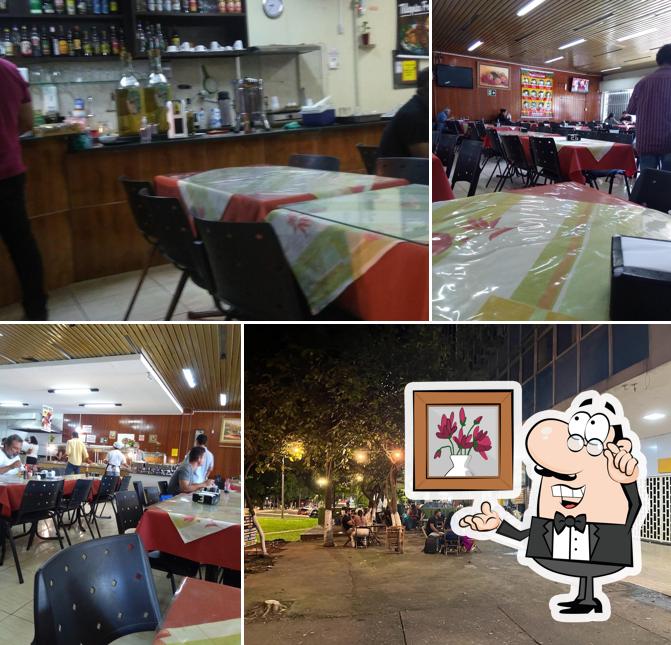 O interior do Delicia Brasil Restaurante