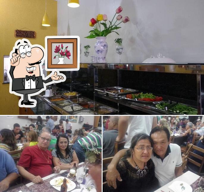 Dê uma olhada a imagem ilustrando interior e comida no Dom Afonso