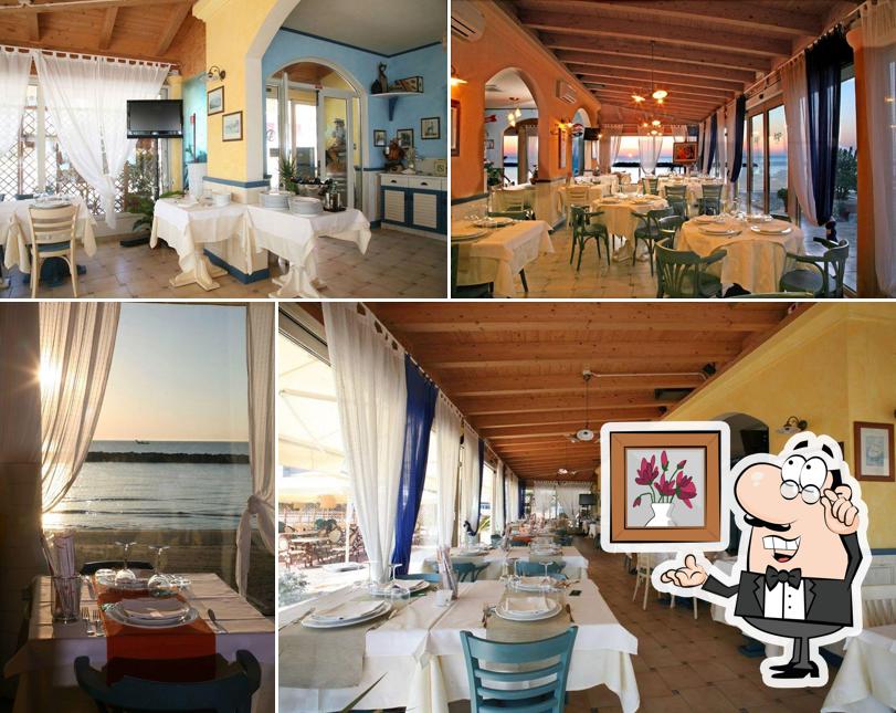 Dai un'occhiata agli interni di Ristorantino SOLE & MARE famiglia CUCA'