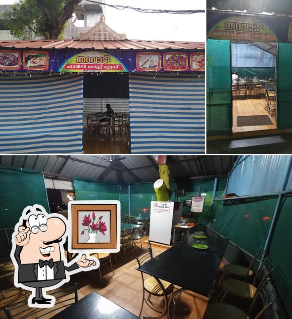 Among various things one can find interior and exterior at Tharavadu Family Fast Food