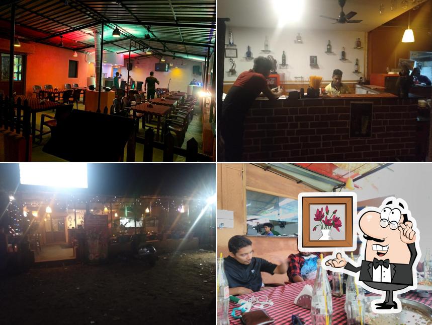 Take a seat at one of the tables at 23 PPL Restaurant & Aniket Bar