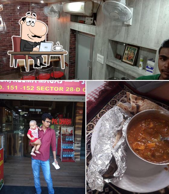 Take a seat at one of the tables at Pal Punjabi Dhaba