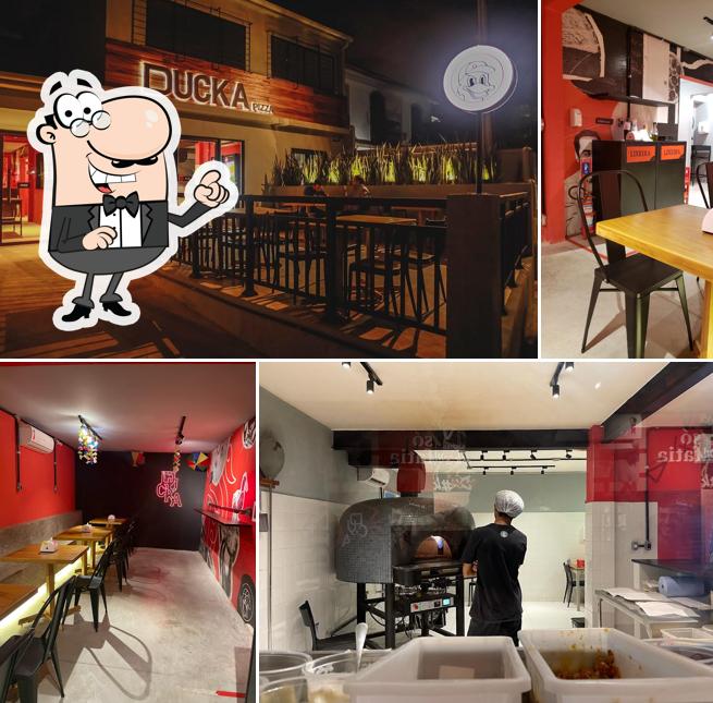 O interior do Ducka Pizza