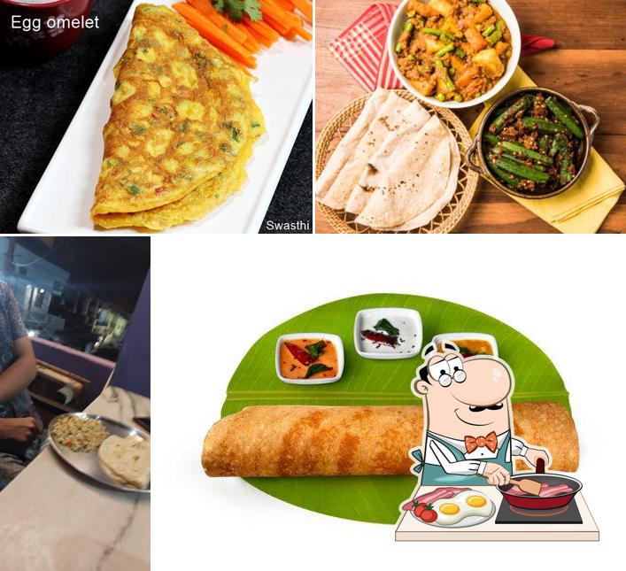 Pushpa - Home Cooked Food (Puhspa Guest House) Restaurant in Hampi