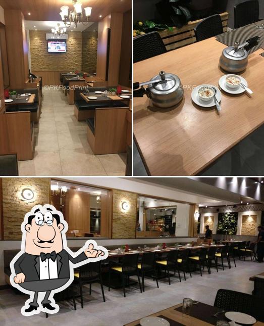 Take a seat at one of the tables at Raaga Restaurant