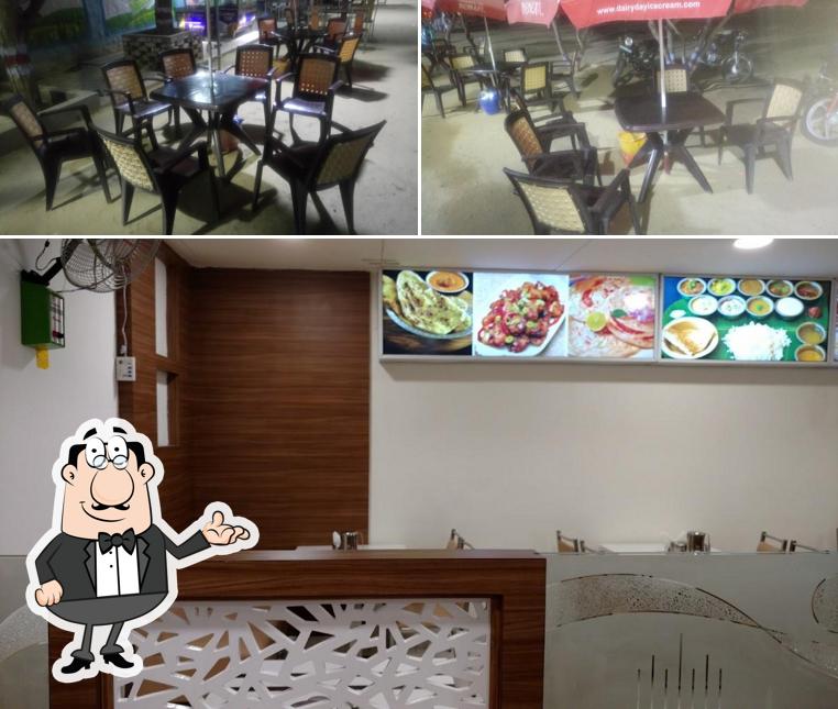 Take a seat at one of the tables at Aahhaa Sweets & Snacks