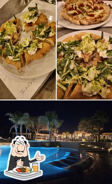 Dai un’occhiata alla immagine che presenta la cibo e esterno di Spazio by Franco Pepe