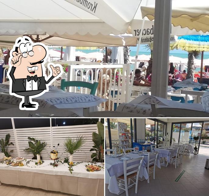 Siediti a un tavolo di Chalet Ristorante Peccato Solo D'estate