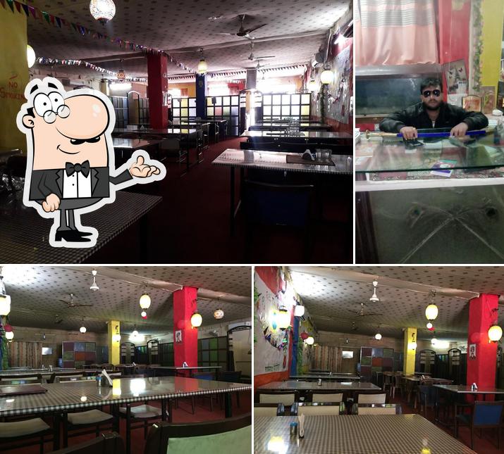 The interior of A/C Pure Veg. Restaurant Jain Parashawanath Shake & IceCream Fast Food Hut