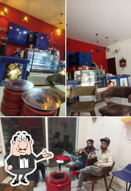 Take a seat at one of the tables at CAFE COFFEE BEANS