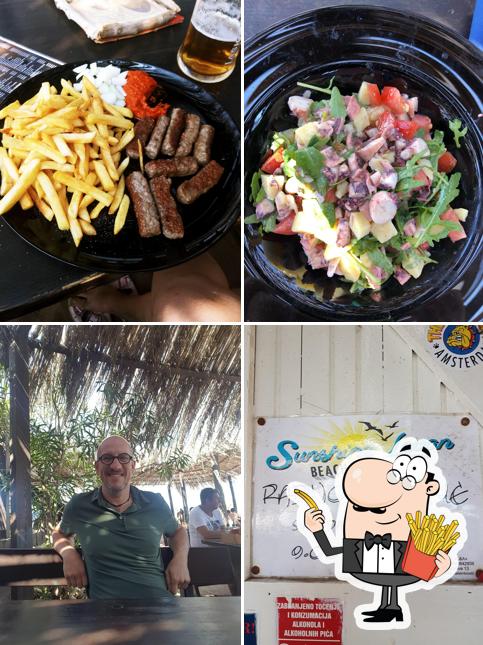 Ordina un piatto di chips a Sunshine Levan, beach bar & restaurant