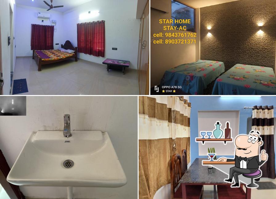 Take a seat at one of the tables at STAR HOME STAY A/C - HOUSE FOR RENT, HOTEL, STAY