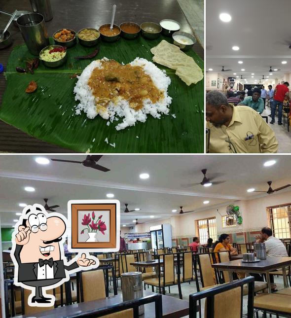 Take a seat at one of the tables at Ratna Cafe