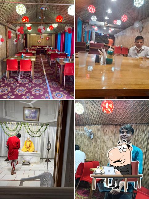 Take a seat at one of the tables at Chatkaar's Handi Best Family Resturant In Lucknow