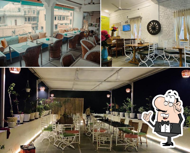 Take a seat at one of the tables at Millets Of Mewar