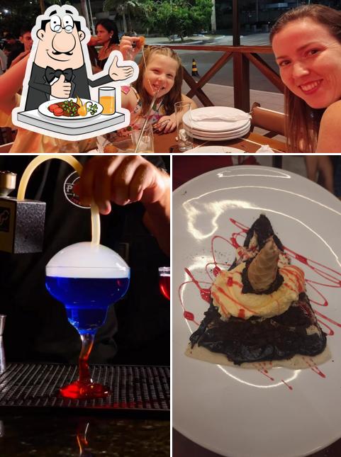 A foto a Pit Stop Espetaria’s comida e mesa de jantar