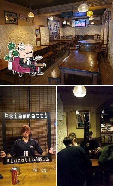 Siediti a un tavolo di Billy's Pub, Birreria con cucina e pizzeria