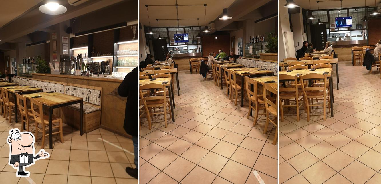 Dai un'occhiata agli interni di Pizzeria Millennium