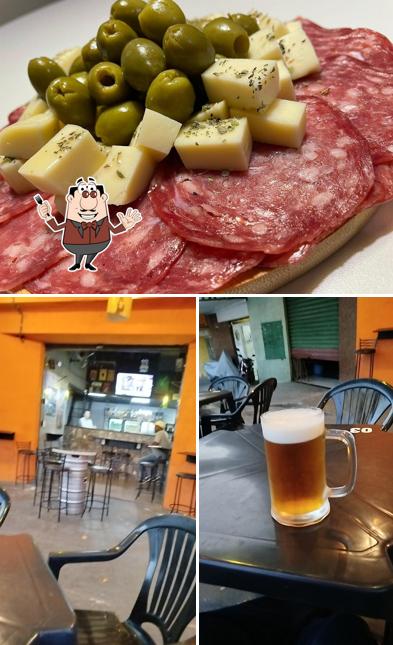 Esta é a imagem apresentando comida e interior no Box 100 Tap Bar