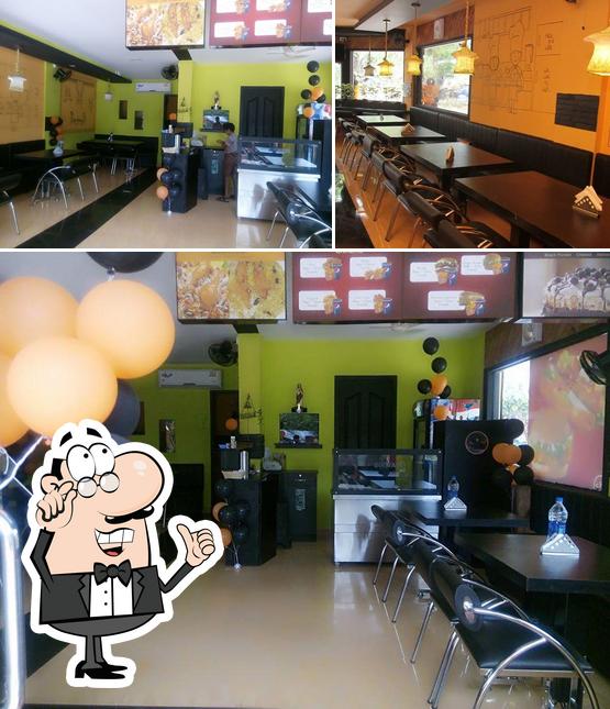 The interior of Hus & Wif Burger Hamper Thrissur