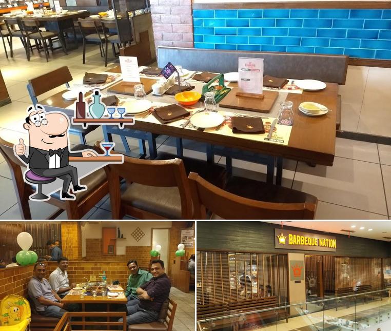 Take a seat at one of the tables at Barbeque Nation