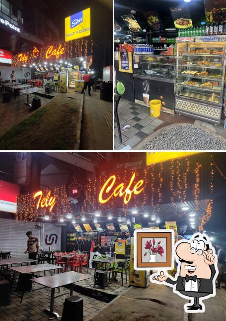 Check out the image displaying interior and exterior at Tely cafe