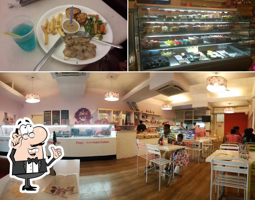 The picture of interior and food at Puppy's Bakery - Exclusive Desserts Continental Cuisine Instagrammable Café in Madurai - Anna Nagar