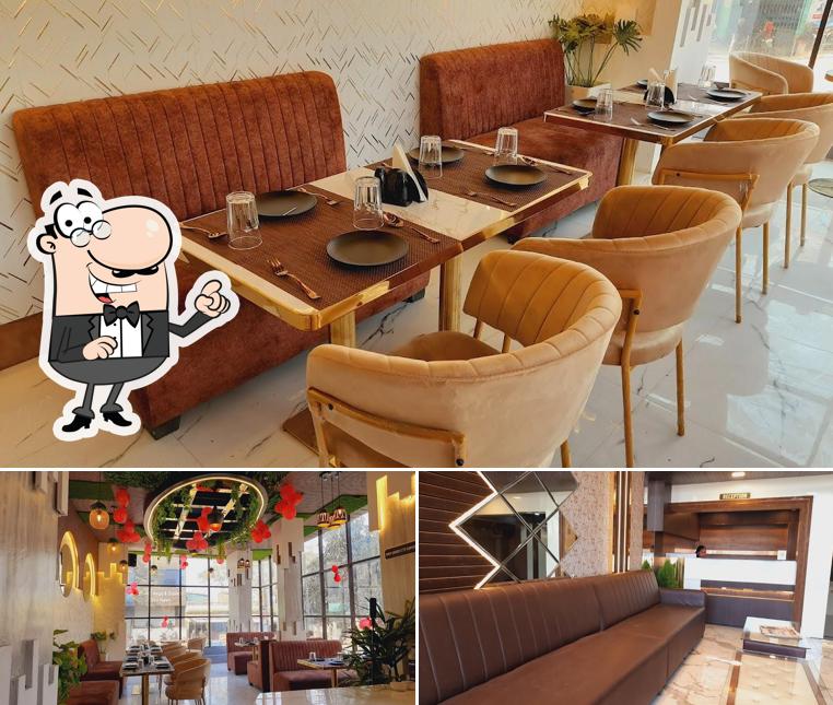 Take a seat at one of the tables at Hotel Grand Patliputra