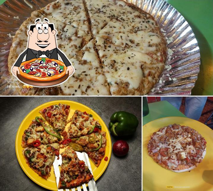 Order pizza at THE THREE MONKEY'S UNDERGROUND CAFE