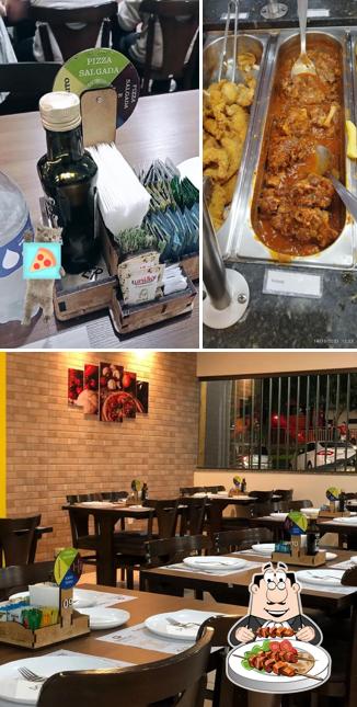 Entre diversos coisas, comida e interior podem ser encontrados no Don Ritter Pizzaria & Restaurante