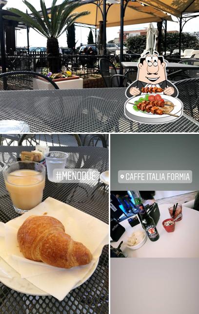 Dai un’occhiata alla foto che mostra la cibo e interni di Caffè Italia