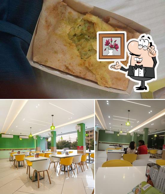 Among different things one can find interior and food at RASRAJ SWEETS AND RESTAURANT (NAGPUR)