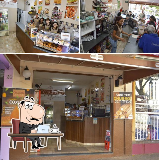 Veja imagens do interior do Aconchego café Extrema