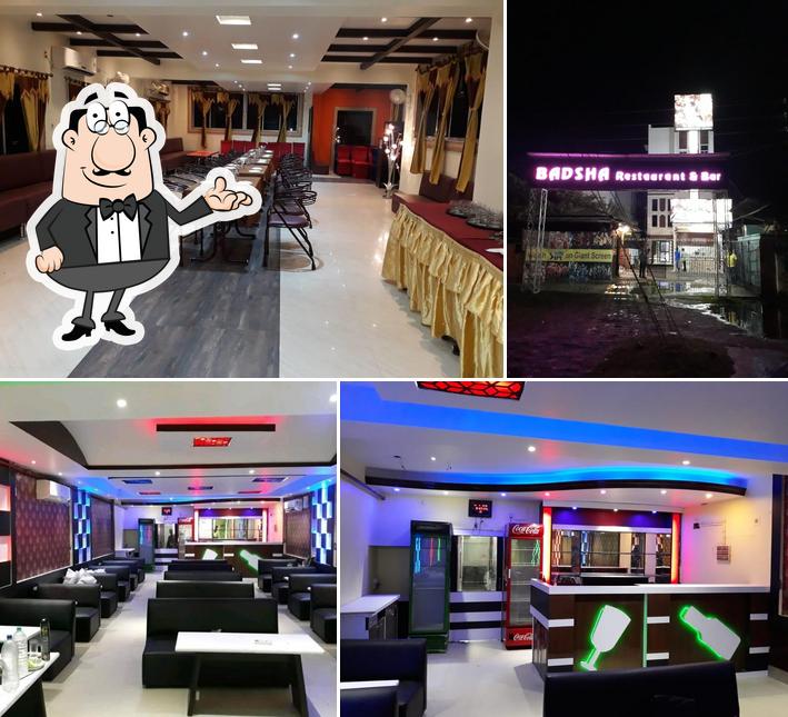 Take a seat at one of the tables at Badsha Restaurant cum Bar