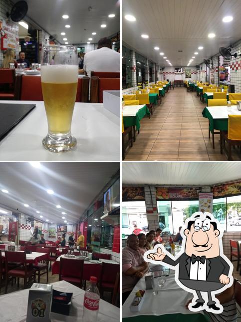 O interior do Rei do Frango Passarinho São Vicente