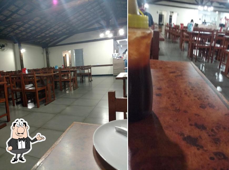 O interior do Pizzaria Guanabara Pedra Azul