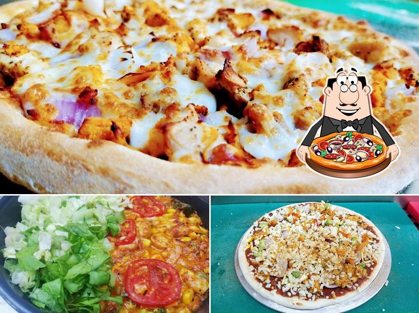 Try out pizza at TOWN KITCHENS