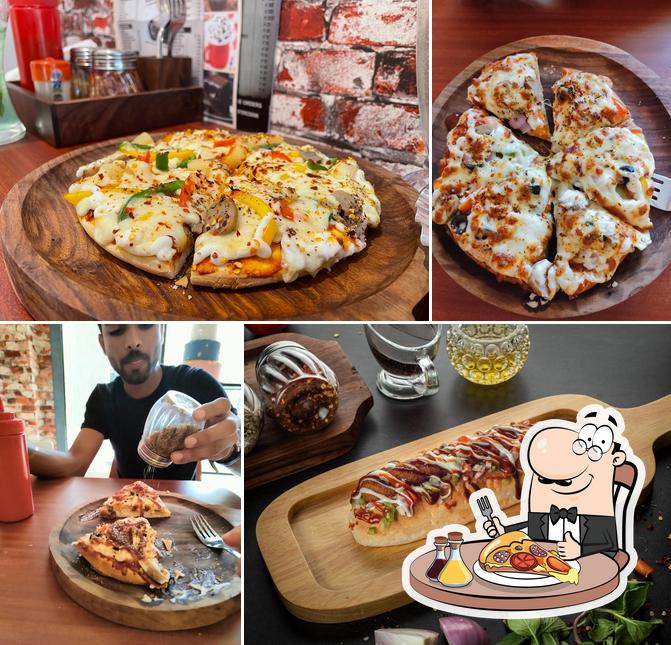 Order pizza at 7th Heaven Coochbehar