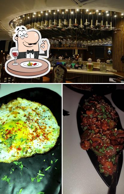 Among various things one can find food and interior at On The Rocks - Restobar & Lounge - Mahal